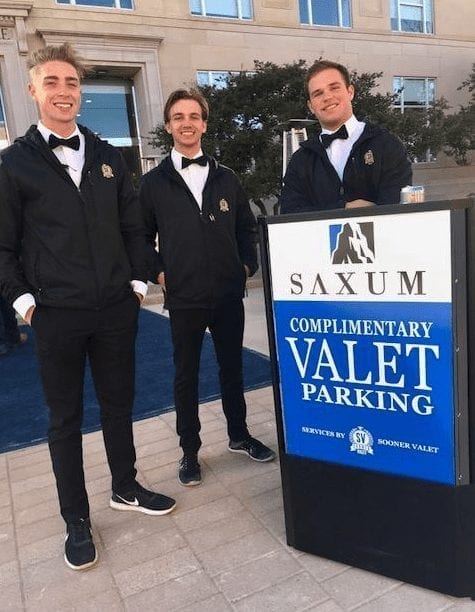 Sooner Valet Crew with a Portable Podium